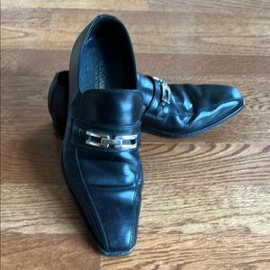 Dolce & Gabbana Black Leather Slip-On Loafers with Gold Chain Detail